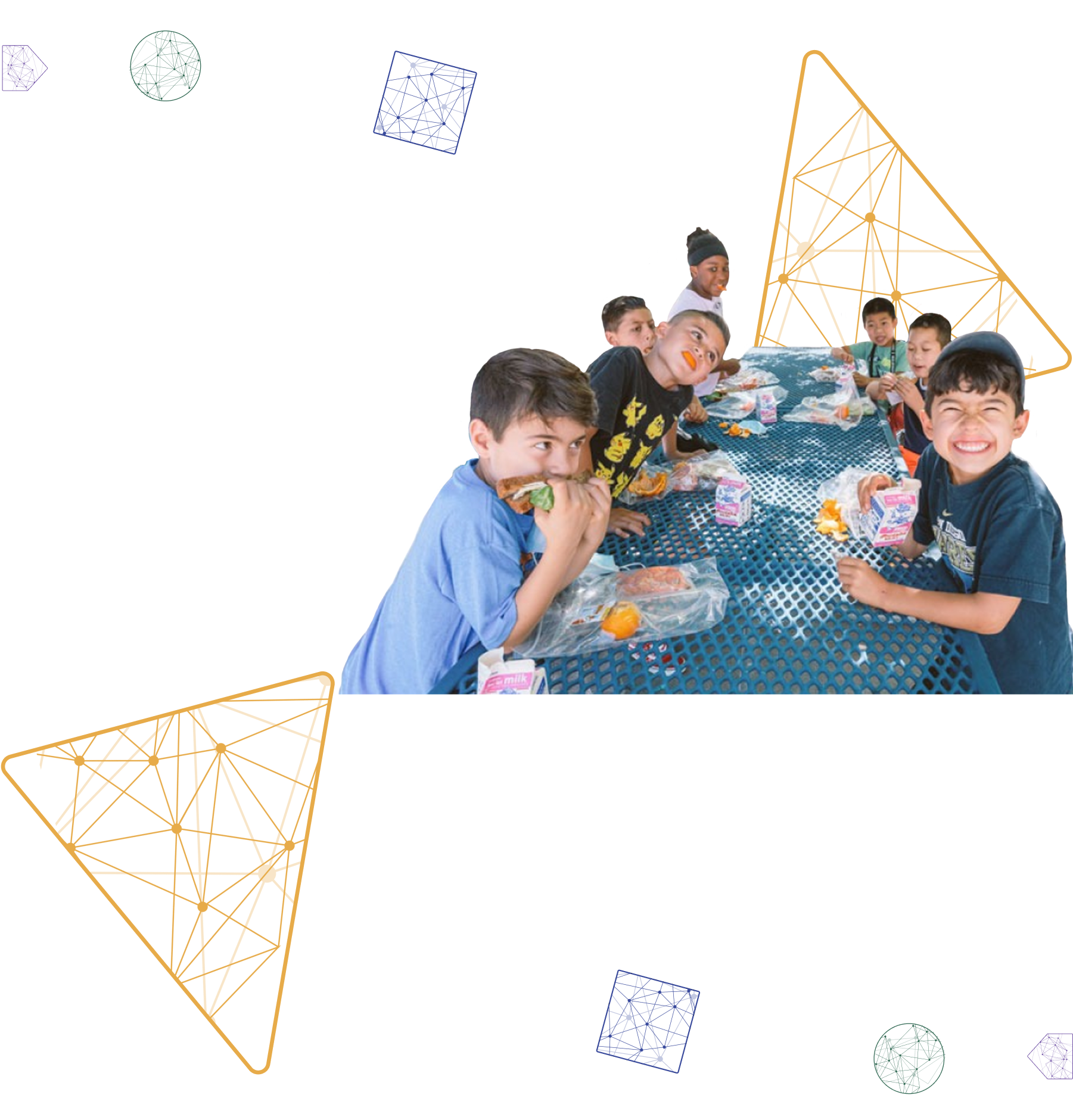 Kids enjoying lunch at a picnic table